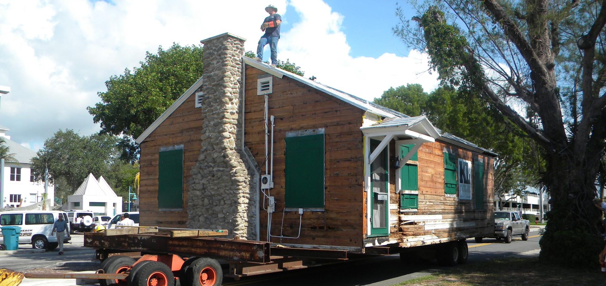 Ruth Jones Cottage being moved on tractor trailer to new development site